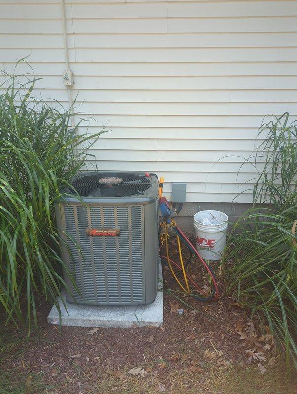 Completed full HVAC system installation including new furnace and air conditioning condenser unit. Furnace installed in basement utility area with proper PVC venting and connection to existing ductwork. AC condenser positioned on exterior concrete pad against building with appropriate clearance, connected refrigerant lines, and verified proper refrigerant charge using manifold gauges. All electrical connections completed, system tested and operational.