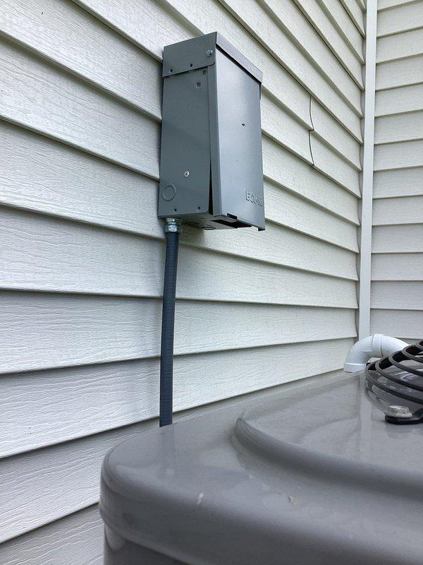 Completed annual cooling maintenance on 2-year-old Bryant system. Verified and updated best contact number on account. Inspected outdoor condenser unit and electrical disconnect box, confirming proper mounting and secure conduit connections. All equipment operating within normal parameters with no issues identified during tune-up service.