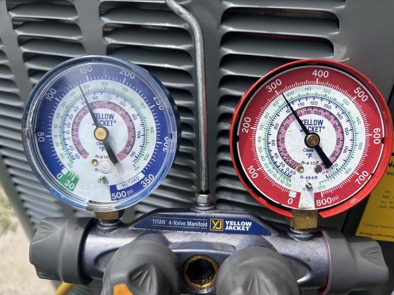 Completed full air conditioning system replacement in residential basement utility area. Installed new Lennox HVAC unit with integrated furnace system, including proper mounting, electrical connections, and refrigerant line installation. Connected and secured all PVC condensate drainage lines and metal ductwork to existing ventilation infrastructure. Performed system startup, charged refrigerant to manufacturer specifications using manifold gauges, and verified proper pressures and temperatures across all zones. All components tested and operational upon completion.