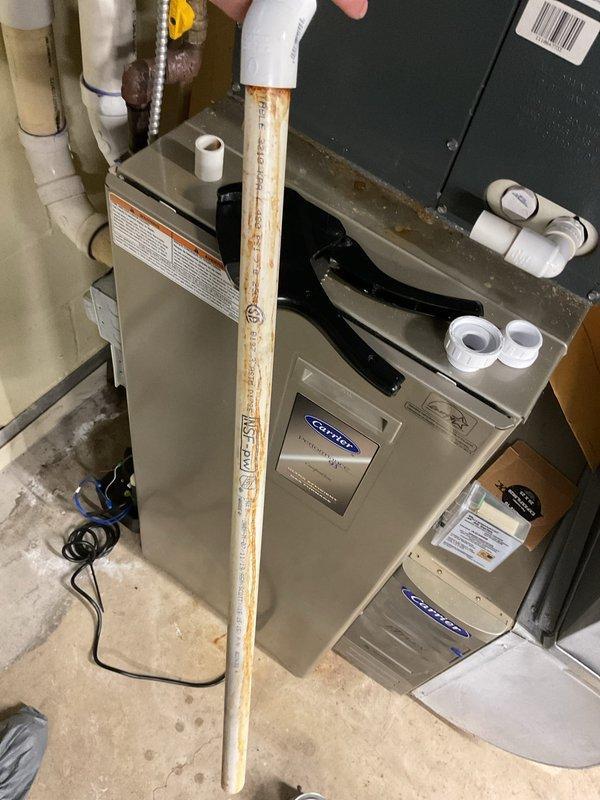 Completed annual cooling maintenance on 14-year-old Carrier HVAC system. Performed comprehensive tune-up including filter inspection, condensate drain line verification with drain pan assessment, system measurements, and operational testing. Unit operating within normal parameters; no immediate repairs required at this time.