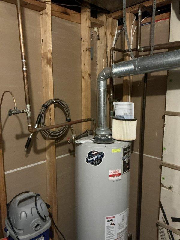 Completed estimate for air conditioning system replacement at residential property experiencing inadequate cooling performance during peak temperature conditions. Evaluated existing HVAC equipment in basement mechanical room, including current furnace/air handler and associated ductwork system. Documented equipment specifications, assessed system capacity limitations, and photographed existing installation to provide comprehensive replacement options for either traditional air conditioning unit or heat pump system to address cooling deficiency issues.