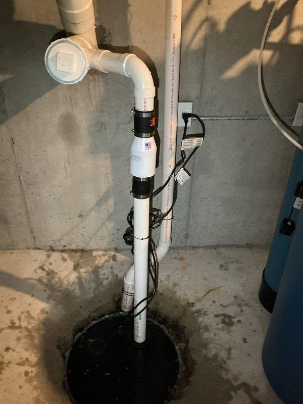 Replaced failed sewage ejector pump in basement sump pit with new unit, installed new discharge piping assembly with proper check valve and venting, and tested system operation to ensure proper functionality. All electrical connections secured and pump cycling verified under load conditions.