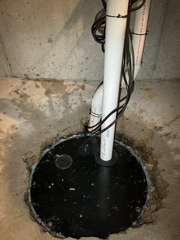 Replaced failed sewage ejector pump in basement sump pit with new unit, installed new discharge piping assembly with proper check valve and venting, and tested system operation to ensure proper functionality. All electrical connections secured and pump cycling verified under load conditions.