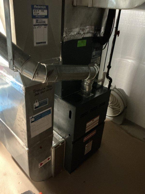 Completed annual cooling maintenance on 2019 EnergiAir system, performing inspection of furnace, air handler, and associated ductwork in basement utility area. All components inspected and photographed, including electrical connections, ventilation systems, and HVAC equipment operation verified for optimal performance. System found to be functioning properly with no immediate repairs required.