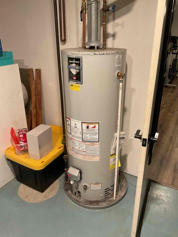 Provided estimate for water heater replacement in residential utility room. Assessed existing water heater installation, documented current plumbing connections including copper supply lines, pressure relief valve, and associated piping configuration. Evaluated installation space, clearances, and access for potential replacement unit.