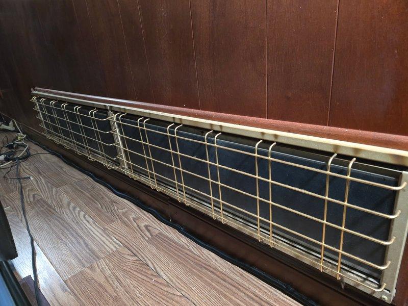 Completed annual cooling maintenance on 3-year-old Carrier unit under warranty through September 2027. Inspected system components, verified proper operation, and documented existing vintage thermostat and electric baseboard heating system with photos for service records.
