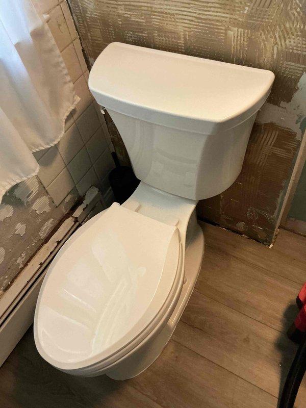 Responded to service call at 5-year-old residential property for toilet removal and leaking faucet repair. Upon arrival, assessed bathroom undergoing active renovation with partial tile installation in progress. Successfully removed existing toilet fixture from location as requested by homeowner. Addressed previously repaired faucet that had developed new leak, identifying failed seal as root cause of recurring water seepage. Replaced worn components and tested system to verify proper function and complete elimination of leak. Coordinated work around ongoing tile installation, ensuring plumbing fixtures remained protected during construction phase. All work completed without complications, fixtures tested and verified operational before departure.