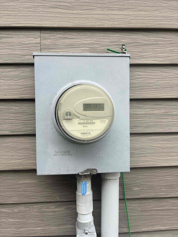 Completed comprehensive estimate for new homeowners requiring replacement of aging HVAC system, water heater, and installation of standby generator where none currently exists. Evaluated existing furnace, air conditioning unit, and water heater in basement utility area, assessed electrical service capacity at exterior meter, and determined equipment specifications and installation requirements for complete system upgrades including new generator installation.