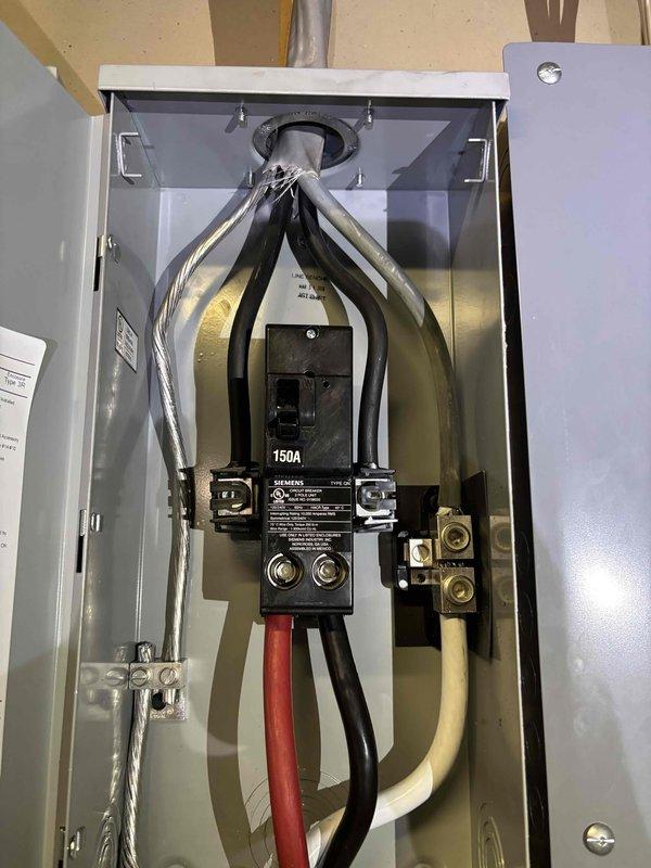 Responded to inspector correction notice regarding improperly rated electrical disconnects. Inspector identified that existing 200A disconnects exceeded the capacity of 2/0 aluminum feeder cables supplying the sub panels. Replaced two 200A disconnects with appropriately sized 150A Siemens units to comply with ampacity ratings for the installed aluminum conductors. Verified proper termination of all feeder conductors, ensured secure conduit connections, and confirmed all safety labeling was in place on both disconnect boxes.