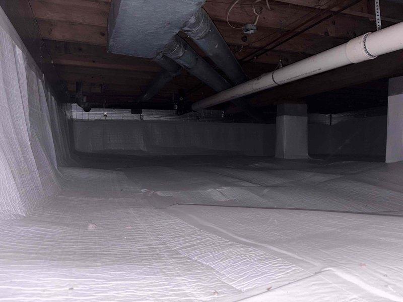 Conducted comprehensive plumbing assessment for residential property experiencing weak water pressure throughout the house, with specific evaluation of two bathroom sinks and kitchen fixtures. Provided estimate for toilet installation in basement area and addressed additional plumbing concerns in the lower level utility space. Documented existing mechanical systems, exposed piping infrastructure including PVC and metal supply lines, and crawl space conditions with vapor barrier present for project planning purposes.