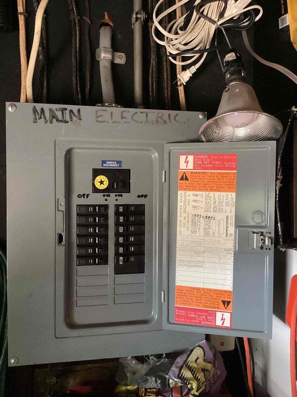 Completed estimate for adding air conditioning system to residential property. Documented existing electrical infrastructure including main service panel with adequate capacity for AC installation. Assessed attic space conditions and existing ductwork routing. Identified suitable locations for equipment placement and evaluated electrical service requirements for new AC unit integration. Photographed current electrical panel configuration and attic utility connections to support system design and installation planning.