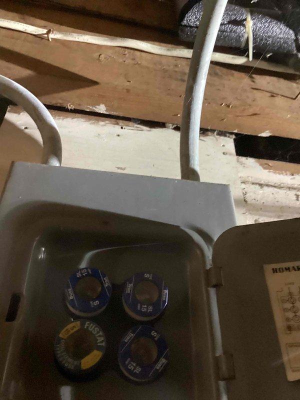 Completed estimate for adding air conditioning system to residential property. Documented existing electrical infrastructure including main service panel with adequate capacity for AC installation. Assessed attic space conditions and existing ductwork routing. Identified suitable locations for equipment placement and evaluated electrical service requirements for new AC unit integration. Photographed current electrical panel configuration and attic utility connections to support system design and installation planning.