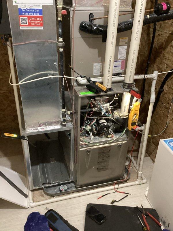 Completed comprehensive Super Tune-up service on both air conditioning and furnace systems, each approximately 4 years old. Performed thorough inspection of furnace unit with cabinet access for internal component evaluation, including blower motor, electrical connections, and mechanical assemblies. Verified proper operation of condensate drainage system and PVC venting. Conducted diagnostic testing using multimeter to ensure all electrical parameters were within manufacturer specifications. Documented equipment condition through photographic records for service history.