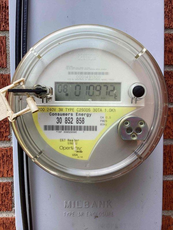 Conducted on-site evaluation for whole-home generator installation at 45-year-old single family residence. Assessed existing 200-amp electrical service with Milbank Type 1A meter enclosure and main distribution panel located in basement utility area. Documented current electrical infrastructure including circuit breaker configuration, service entrance wiring, and available space for transfer switch installation. Photographed meter base with digital Consumers Energy meter and existing panel with adequate clearance for generator tie-in. Evaluated basement access, panel capacity, and electrical load requirements to develop comprehensive installation estimate. Provided customer with detailed quote for generator system including equipment specifications, transfer switch requirements, and installation scope.