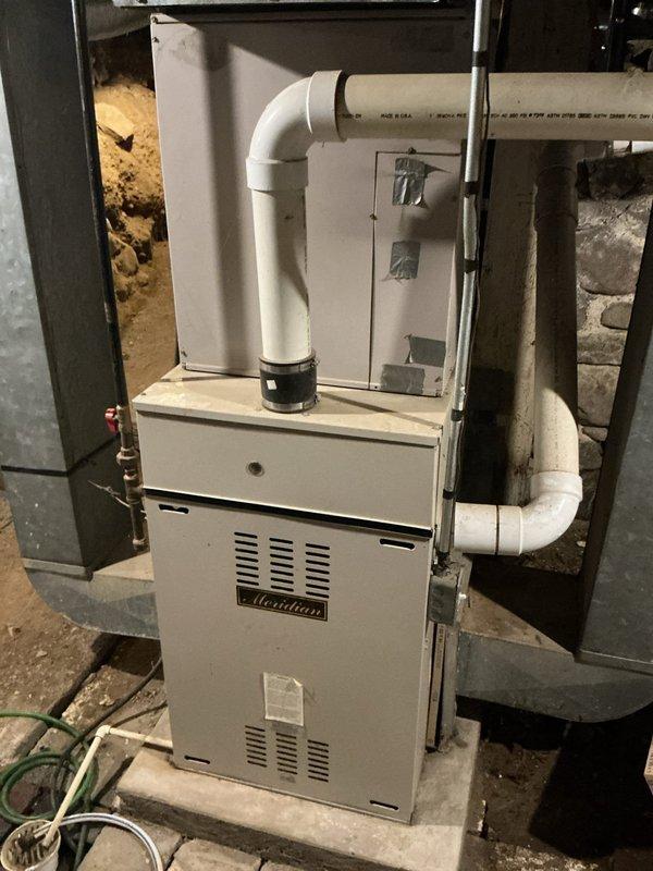 Responded to no hot water complaint on 8-year-old Bradford White Defender Safety System water heater. Upon inspection, diagnosed failed gas control valve preventing burner ignition. Replaced gas control valve, tested unit operation, verified proper ignition sequence and flame characteristics. Unit restored to full heating capacity with all safety systems functioning correctly.