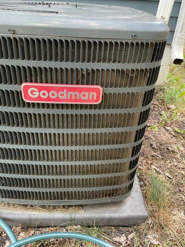 Completed annual cooling maintenance on 8-year-old Goodman outdoor condenser unit. Performed comprehensive tune-up inspection, cleaned condenser coils and fins to remove accumulated dirt and debris, verified refrigerant levels, tested electrical connections and capacitor operation, and confirmed proper system function. Unit operating within normal parameters upon completion.