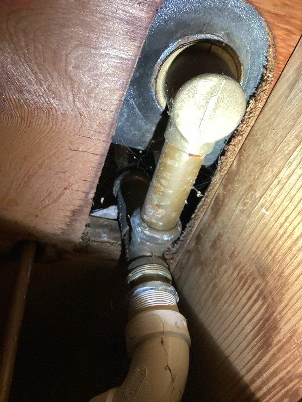 Completed shower diverter repair in residential bathroom. Accessed plumbing through floor penetration, replaced faulty diverter valve component, and ensured proper water flow direction between shower and tub fixtures. Verified system operation with no leaks detected upon completion.