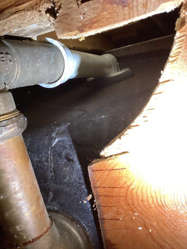 Completed shower diverter repair in residential bathroom. Accessed plumbing through floor penetration, replaced faulty diverter valve component, and ensured proper water flow direction between shower and tub fixtures. Verified system operation with no leaks detected upon completion.