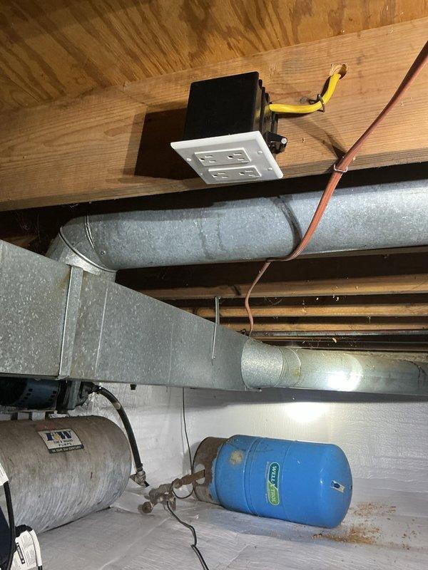 Installed dedicated 120V circuit for sump pump system in basement area. Added new single-pole breaker to existing electrical panel, clearly labeled "Sump" for identification. Routed NM cable from panel through exposed joist space to sump pump location, securing wiring per code requirements. Terminated circuit at appropriate outlet/control device near pump equipment. Verified proper operation of new circuit and confirmed sump pump functionality upon completion.