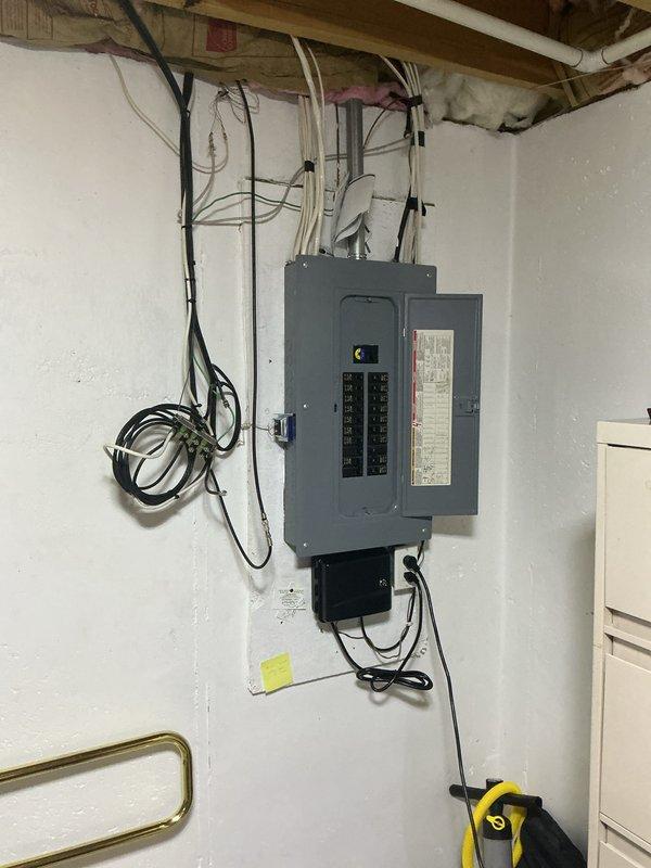 Conducted on-site assessment for mini split installation in sunroom to provide climate control. Evaluated existing electrical infrastructure including main breaker panel capacity and available circuits to determine power requirements for proposed ductless system. Documented electrical panel configuration and wiring conditions to ensure proper integration of new equipment.