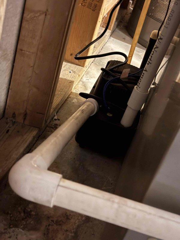 Completed installation of manual control humidifier system in residential basement mechanical room. Unit was properly mounted, connected to existing HVAC ductwork, and integrated with water supply line using PVC piping. System was tested and left operational for improved indoor air quality control.