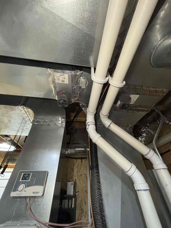 Completed annual cooling system maintenance on 9-year-old HVAC unit. Performed comprehensive tune-up including inspection of furnace, ductwork, condensate drainage system, electrical connections, and control components. System operational and ready for continued service through 2026 contract period.
