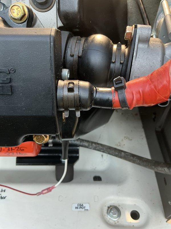 Completed annual generator tune-up on 7-year-old Generac unit per authorized maintenance schedule. Performed comprehensive inspection of all mechanical components including engine assembly, fuel system connections, and mounting hardware. Inspected flexible fuel line connectors with metal clamps, brass fittings, and corrugated protective sleeves for proper installation and condition. Verified secure mounting of all equipment to rooftop platform, checked cabinet housing integrity, and confirmed all bolts and brackets were properly torqued. All components found in good operational condition with no signs of deterioration or required repairs. Unit tested and operating within manufacturer specifications.
