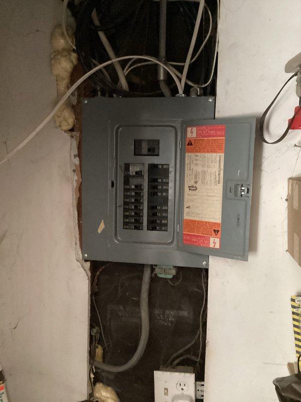 Conducted site evaluation for generator transfer switch installation at residential property. Documented existing electrical service configuration including outdoor meter installation with weatherproof enclosure and interior main breaker panel. Assessed current electrical infrastructure, conduit routing, and panel capacity to determine feasibility and requirements for transfer switch integration. Provided photographic documentation of meter base, service entrance conductors, grounding system, and main distribution panel for preparation of installation quote.