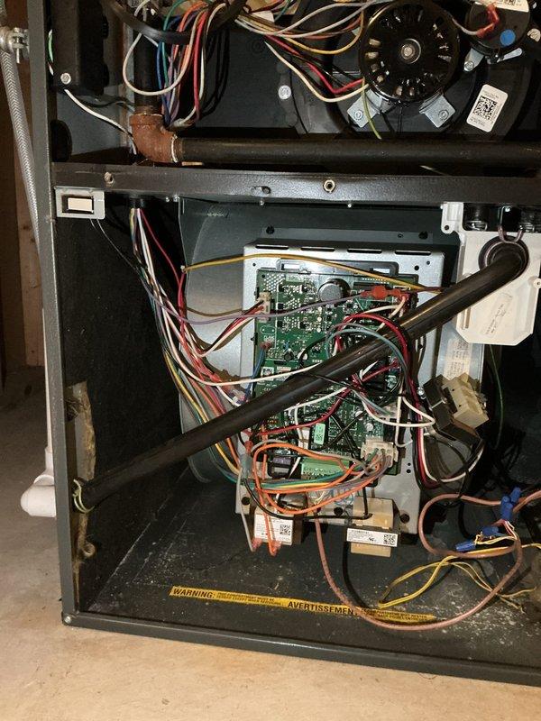 Responded to inspector correction request regarding concerns about blower box and safety switch on 9-year-old furnace. Performed thorough inspection of blower motor assembly, control boards, wiring connections, and all safety devices. Verified proper operation of blower motor, examined all wire terminations for secure connections, and tested safety switch functionality. All components found to be operating within manufacturer specifications with no deficiencies noted. Documented equipment condition with photos for record.