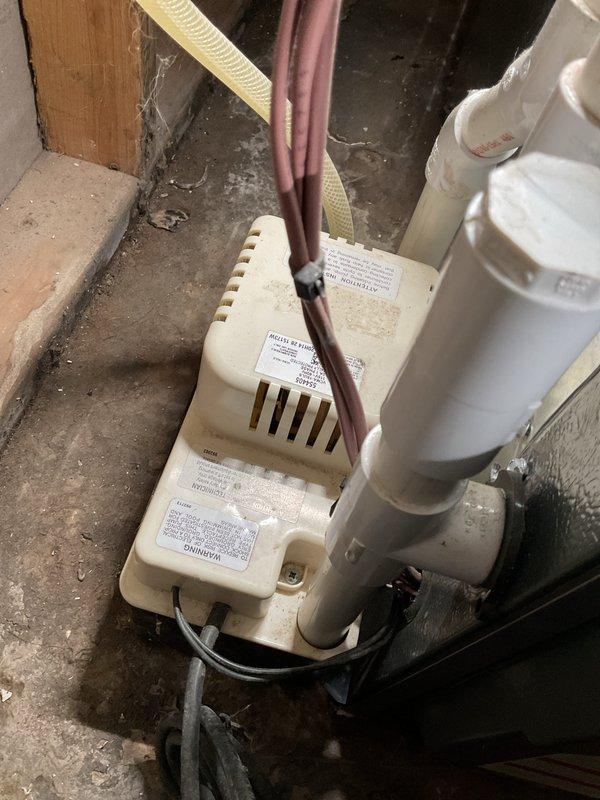 Completed ASTU-AC Super Tune-up on Energi Air WT 11-2030 system due to reduced cooling performance. Performed comprehensive inspection of outdoor condenser unit and indoor components. Condenser unit showed good overall condition with minor weathering on exterior cabinet; verified proper airflow through louvers and fan grille assembly. Inspected condensate pump system in basement utility area; confirmed proper operation of pump with discharge lines routing correctly. Conducted full system diagnostics including refrigerant levels, electrical connections, and thermostat calibration to address cooling deficiency concern.