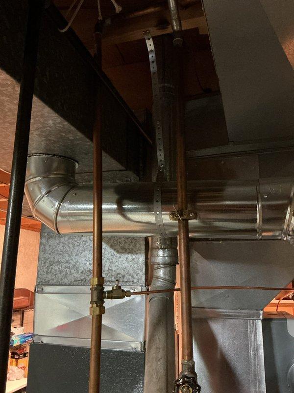 Completed annual cooling system tune-up and maintenance inspection on HVAC equipment. Performed comprehensive system evaluation including inspection of ductwork connections, refrigerant lines, and associated plumbing components. Verified proper operation of all mechanical systems, checked copper line connections and fittings for integrity, and documented equipment condition with photographic records for service history.