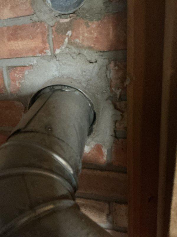Responded to no hot water condition affecting entire residence. Evaluated existing 21-year-old Bradford White tank-style water heater installed in basement utility area. Unit has exceeded typical service life expectancy and customer requested replacement estimate rather than repair options. Documented current installation configuration including gas supply connections, water piping, venting system through brick wall, and electrical connections. Photographed equipment nameplate data, utility room layout, and existing infrastructure to prepare accurate replacement proposal. No active leaks or immediate safety hazards observed during assessment. Provided comprehensive estimate for new water heater installation.