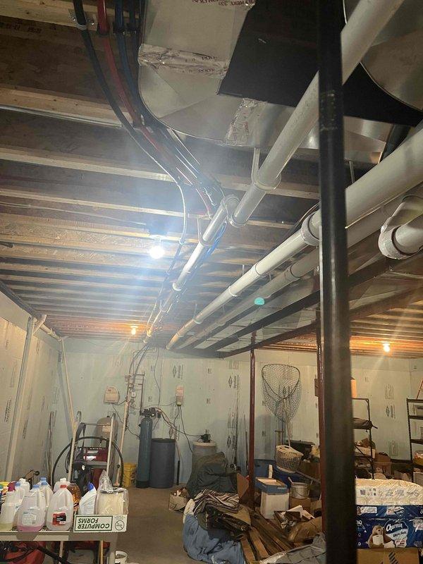 Successfully installed a 50-gallon power vent natural gas water heater in the basement utility area. Connected all necessary water supply lines, gas lines, and venting systems according to manufacturer specifications and local code requirements. Integrated the new unit with the existing pressure tank and plumbing infrastructure, ensuring proper operation of all components.