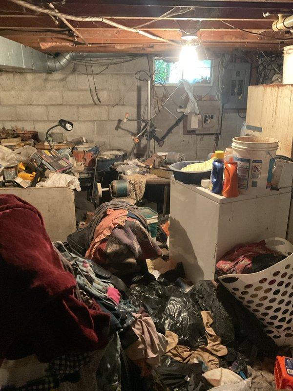 Responded to plumbing leak in basement of 50-year-old single family residence. Upon arrival, found basement utility area with significant clutter and stored items throughout space, making initial access challenging. Inspected exposed copper piping, HVAC ductwork, and concrete block walls for signs of active leakage or water damage. Leak had been present for extended but undetermined period. Conducted thorough visual assessment of plumbing infrastructure, including supply lines and drainage systems visible in basement area. Documented conditions with photographs showing workspace layout, stored materials, and mechanical systems. No additional leaks reported in other areas of home. Completed inspection and provided recommendations for addressing identified plumbing issue.