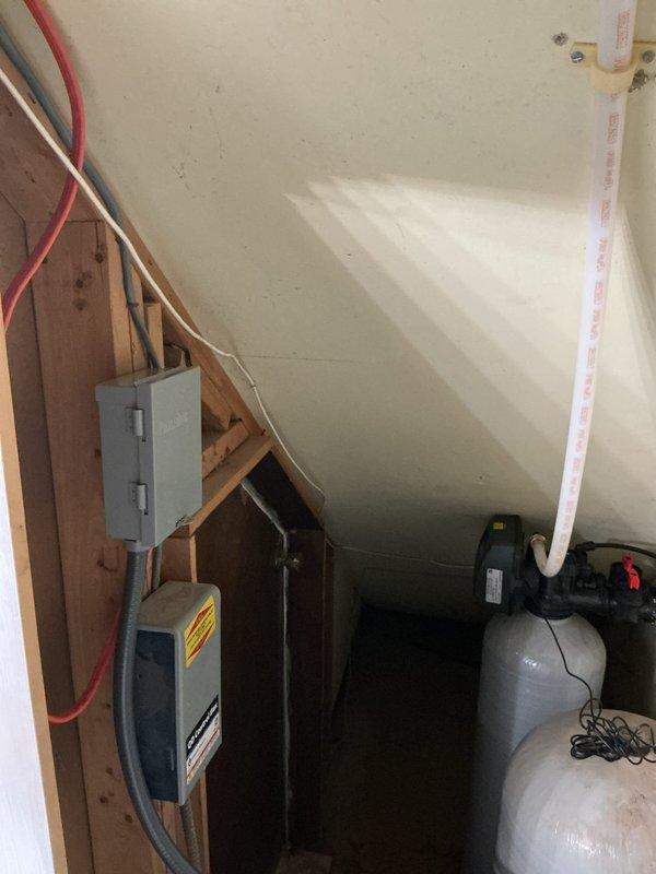 Successfully installed a compact SWS1-30C water softener system and 40-gallon short electric water heater in attic crawl space. Installation included complete electrical connections with dedicated disconnect box, conduit runs, and proper wiring to both units, coordination with electrical contractor for concurrent service, and full plumbing integration with flexible supply lines. Both systems were tested, operational, and covered under 6-year parts and 1-year labor warranty.