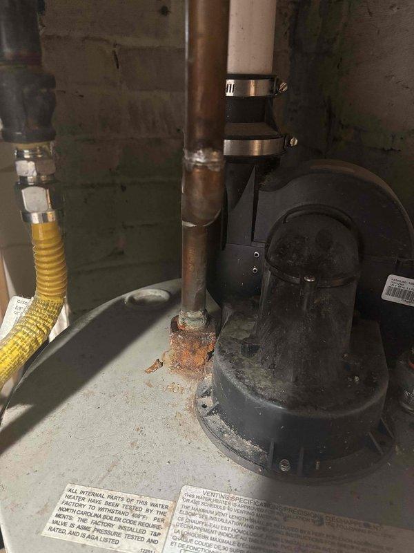 Responded to water heater issue following home inspection report of rotten egg odor during hot water usage. Successfully flushed water heater tank to remove sediment buildup and replaced deteriorated anode rod to eliminate sulfur bacteria causing the odor. System tested and confirmed operational with no remaining odor detected.