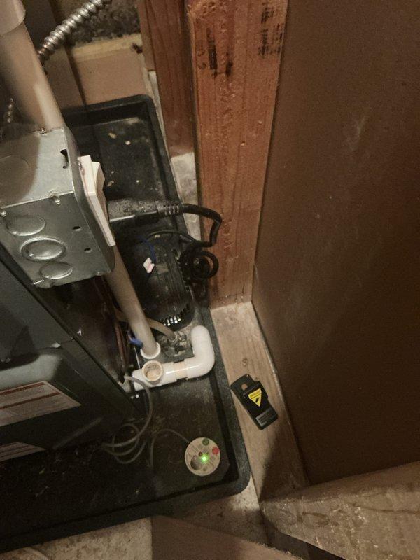 Completed annual AC maintenance and tune-up on residential cooling system. Performed comprehensive inspection of air handler unit and associated components including condensate pump assembly, PVC drain lines, and ductwork connections. Verified proper operation of all mechanical systems, checked electrical connections, and confirmed condensate drainage system functioning correctly. All equipment operating within normal parameters with no issues identified.