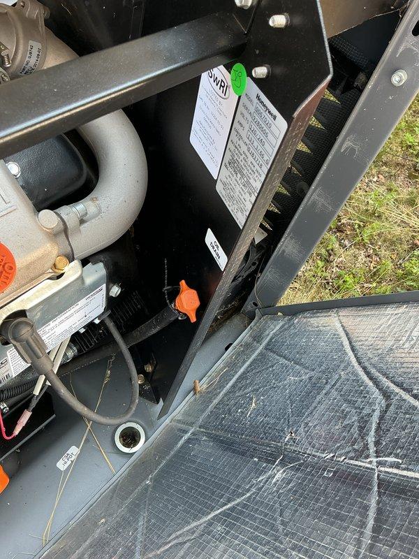Completed comprehensive generator tune-up on 9-year-old Honeywell unit. Performed full system inspection including gas valve assembly, control components, and safety systems. Serviced air filtration system, removing accumulated debris and particulate matter from mesh filter screen. Verified proper operation of all mechanical components, electrical connections, and PVC condensate drainage system. Updated maintenance tag and documented system condition with photographic records. All components found operational with normal outdoor weathering; unit returned to full service.