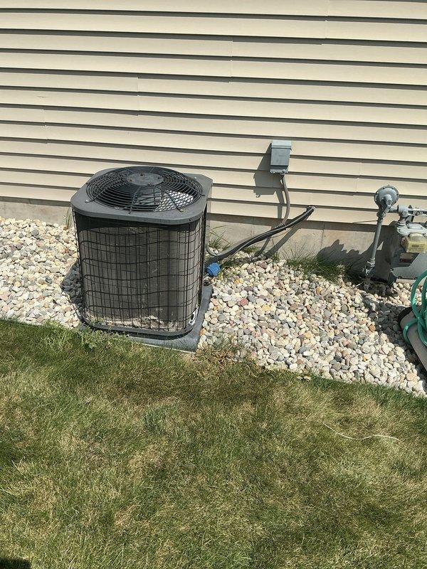 Conducted comprehensive estimate for residential air conditioning system replacement. Documented existing HVAC equipment including basement-mounted furnace with Aprilaire humidifier and associated ductwork, electrical controls, and outdoor condenser unit with refrigerant lines. Assessed current system configuration and provided detailed recommendations for new AC installation to meet customer cooling requirements.