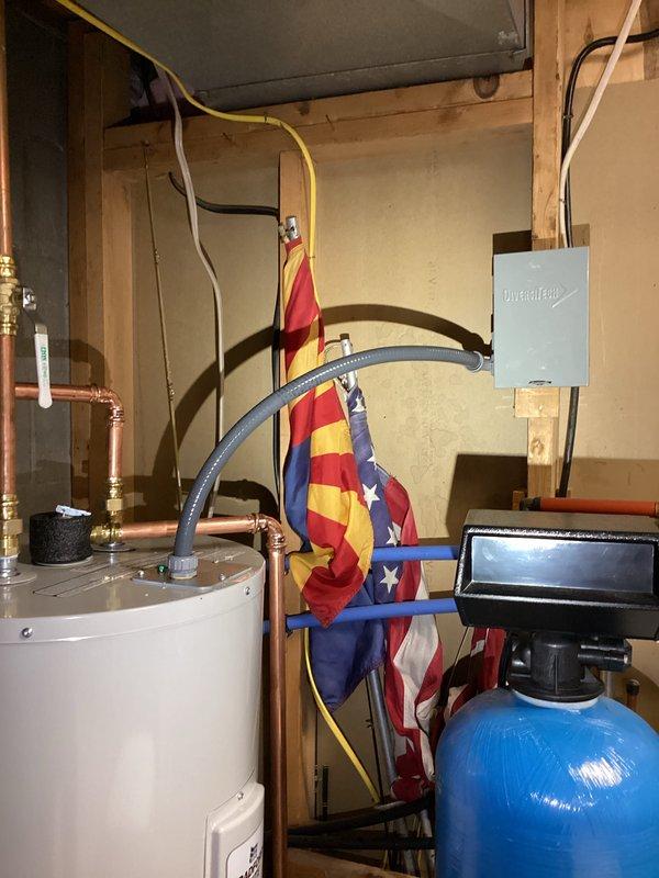 Successfully installed a 50-gallon electric water heater (tall tank, 59" height) in the basement utility area. All copper supply lines, brass fittings, shut-off valves, and electrical connections were properly installed and tested for functionality. The installation includes a 6-year parts warranty and 1-year labor warranty.