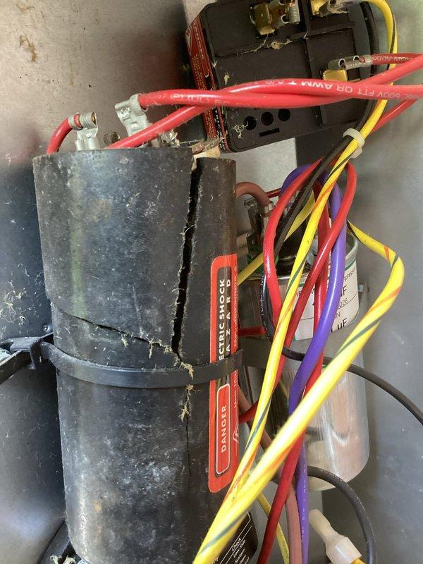 Completed annual cooling maintenance on 9-year-old EnergiAir system with warranty coverage through January 2027. Performed comprehensive tune-up including inspection of electrical components, capacitor, contactor, and all wiring connections. Documented system condition with photos showing electrical control panel components, though significant dust and grime accumulation was noted on capacitor and surrounding areas. All electrical connections verified secure and operational.