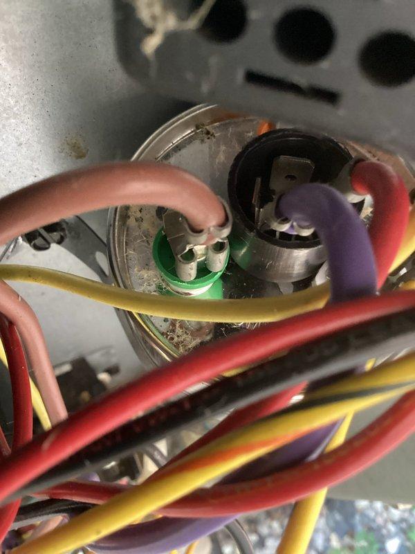 Completed annual cooling maintenance on 9-year-old EnergiAir system with warranty coverage through January 2027. Performed comprehensive tune-up including inspection of electrical components, capacitor, contactor, and all wiring connections. Documented system condition with photos showing electrical control panel components, though significant dust and grime accumulation was noted on capacitor and surrounding areas. All electrical connections verified secure and operational.