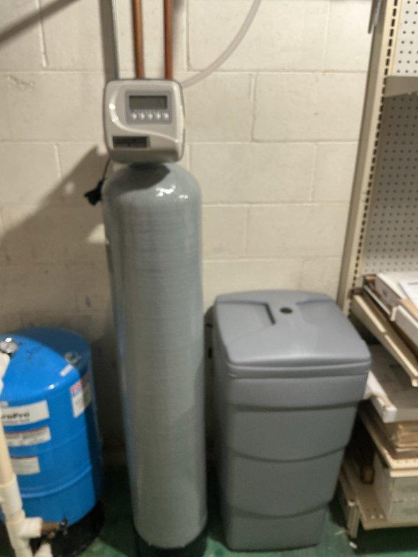 Responded to service call for Sterling water softener system with reported salt consumption issue. Upon inspection, tested water hardness levels and evaluated system operation. Found water softener control head functioning properly with adequate regeneration cycles programmed. Verified brine tank salt level and confirmed minimal usage, indicating system may not be drawing brine effectively during regeneration. Checked brine line connections, venturi assembly, and float mechanism for proper operation. Adjusted regeneration settings and performed manual regeneration cycle to verify brine draw function. Provided water quality test results and system operational recommendations to address salt consumption concerns.