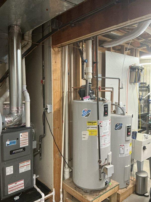 Responded to customer request for estimate regarding exhaust vent clearance near deck area. Conducted site inspection of basement mechanical room containing water heater, furnace, and associated venting systems. Photographed existing installation including exhaust vent routing, ductwork configuration, and clearances to combustible materials. Assessed current exhaust termination location in relation to deck structure to determine code compliance and necessary modifications. Provided customer with recommendations for proper clearance requirements and estimate for any required vent relocation or extension work.