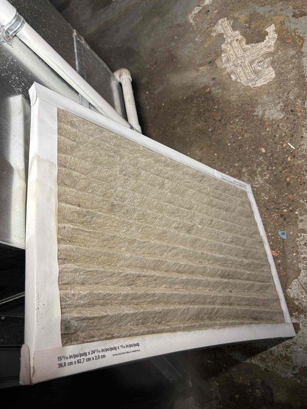 Responded to service call for thermostat displaying error message and water leaking from furnace. Upon inspection, identified clogged condensate drain line causing water backup. Cleared drain line obstruction, verified proper drainage flow, and replaced dirty air filter to restore system efficiency. Thermostat error cleared after system reset, and unit returned to normal operation with no further water leakage detected.