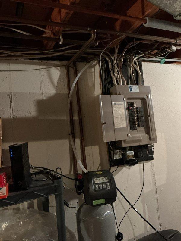 Responded to service call for Sterling water softener displaying error code 102. Upon arrival, found unit installed in January was showing fault code on digital control head. Diagnosed error code 102 as communication failure between control valve and system components. Reset control head by power cycling unit at electrical panel, cleared error code from system memory, and verified proper voltage supply to control unit. Reprogrammed controller settings and confirmed system returned to normal operation with display functioning correctly. Tested water flow through softener tank and verified regeneration cycle initiation. Inspected plumbing connections for proper installation and checked for any signs of leaks or mechanical issues—all connections secure with no moisture present. Examined household faucets as requested and found no issues with fixtures. Educated customer on proper operation of control head and how to monitor system status. Unit now operating as designed with error code reso