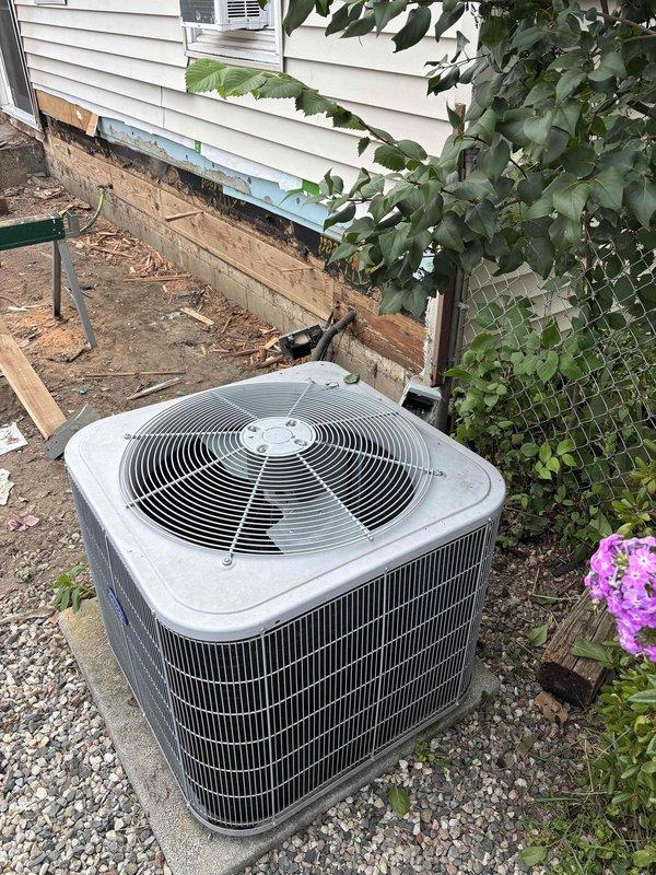 Completed annual cooling maintenance on 12-year-old outdoor condenser unit. Performed comprehensive tune-up including inspection of compressor operation, refrigerant levels, electrical connections, and fan motor function. Unit is operating within normal parameters despite heavy smoking environment inside residence. Provided estimate for potential relocation of condenser unit as requested by client, noting current placement on gravel pad adjacent to foundation with adequate clearance.
