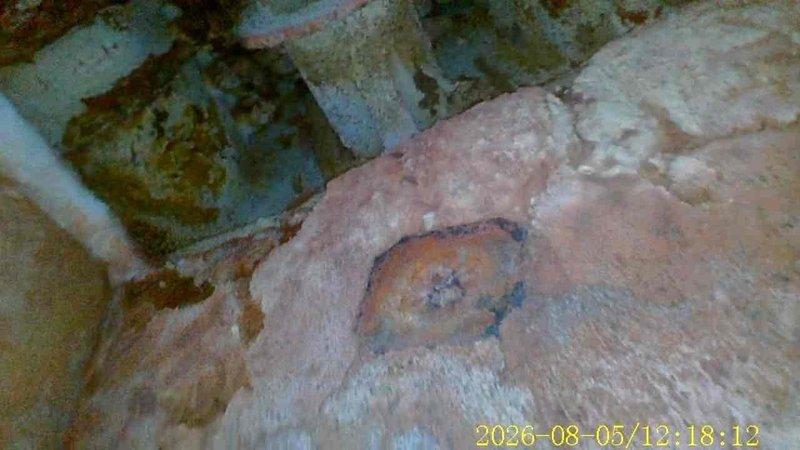 Responded to no heat call at single family residence. Upon arrival, located furnace and performed diagnostic inspection. Discovered significant moisture damage and deterioration to building materials and insulation surrounding furnace area. Evidence of long-term water intrusion with visible rust-colored staining, mold growth, and material degradation throughout insulation and adjacent surfaces. Documented extensive damage with photographs showing compromised insulation integrity and structural concerns. Advised customer of moisture damage findings and potential safety hazards related to furnace operation in current environment. Recommended immediate remediation of water intrusion source and replacement of damaged insulation materials before furnace can be safely serviced or repaired.