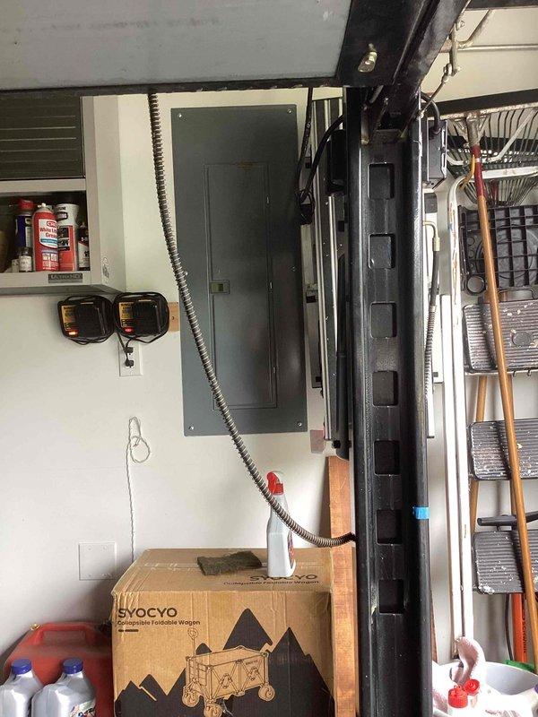 Conducted on-site assessment for standby generator installation. Evaluated existing electrical infrastructure, including main service panel location and available garage space for equipment placement. Documented current electrical configuration with flexible metal conduit connections and panel accessibility. Assessed installation requirements for Kohler standby generator system, including necessary electrical connections, transfer switch placement, and optimal positioning within garage workspace. Reviewed site conditions and clearance requirements for code-compliant generator installation.