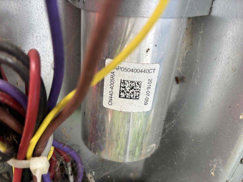 Completed annual cooling maintenance on 9-year-old residential air conditioning system. Performed comprehensive system inspection including electrical testing with digital multimeter, verifying proper voltage and amperage readings at the outdoor condensing unit. Inspected capacitor with date code from 2016, noting visible discoloration on component surface. All electrical connections checked and found secure with proper wire terminations. System operational and cooling effectively at time of departure.